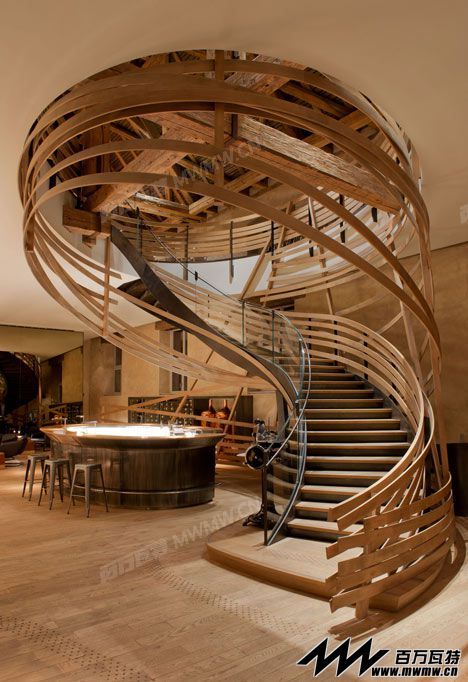 Wooden-strips-coil-around-staircase-at-Strasbourg-hotel-by-Jouin-Manku_dezeen_13.jpg